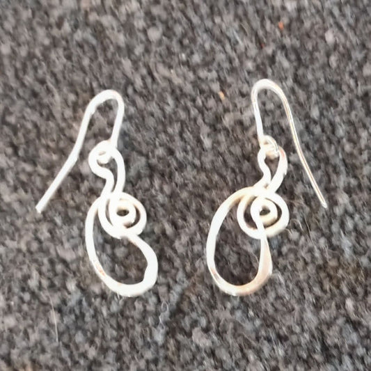 Sterling silver earrings by  Lee Cohn