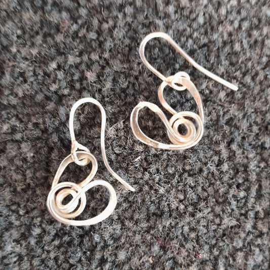 Sterling silver earrings by  Lee Cohn